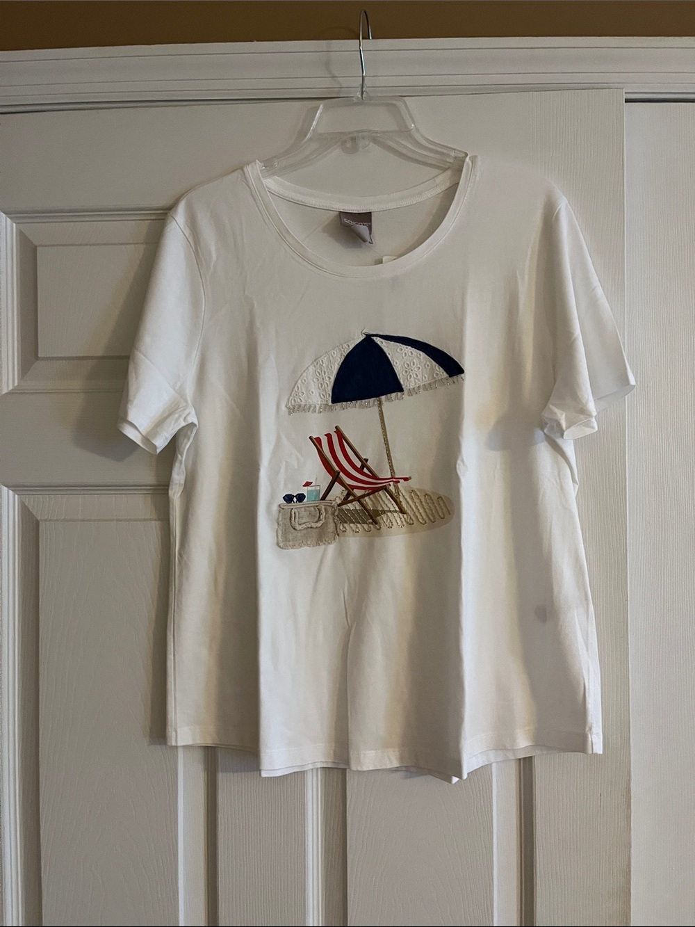 Chico's White Short-Sleeve Tee with Beach Umbrella and Chair Motif.